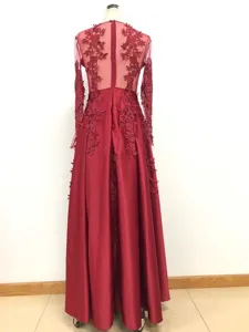 Detailed back view of the elegant burgundy long sleeve lace patchwork evening maxi dress design.