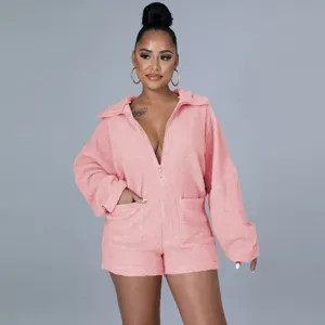 Pink fuzzy fleece romper for women casual zip up short jumpsuit with pockets winter warm apparel.