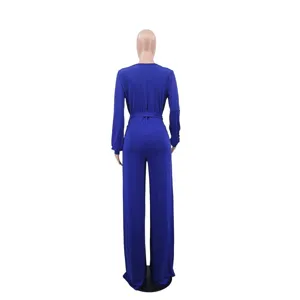 Solid color long sleeve V-neck belted wide leg casual women jumpsuit for autumn winter.
