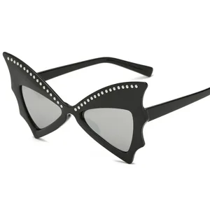 Black bat shaped party sunglasses with rhinestone trim, perfect for Halloween and fun events.