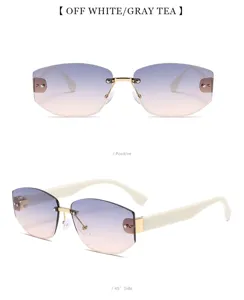 Gafas de sol sin montura elegantes con puente dorado y patillas blancas modernas.