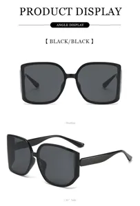 Detailed view of fashionable large-frame multi-sided curved sunglasses in classic black.