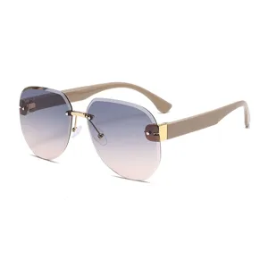 Gafas de sol degradadas irregulares sin montura elegantes para la moda diaria actual.