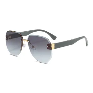 Gafas de sol sin montura elegantes con lentes degradadas para un estilo diario y moderno.