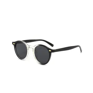 Retro round rivet sunglasses for women and men, vintage black and clear frame UV400.
