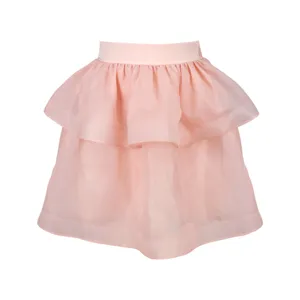 Pink tiered tulle mini skirt with layered ruffle design, delicate sheer mesh fabric detail.