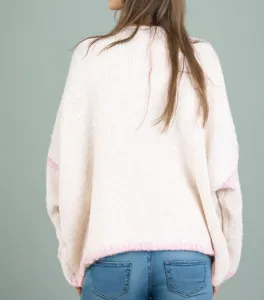 Oversized chunky knit sweater for women, comfortable long sleeve winter cardigan with pink trim.
