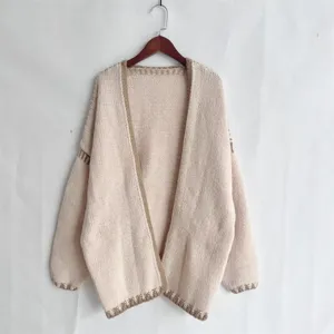 Casual chunky knit cardigan sweater, solid beige color, loose long sleeve design details.