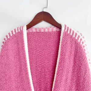 Pink and white chunky knit cardigan detail, cozy loose long sleeve sweater for women.