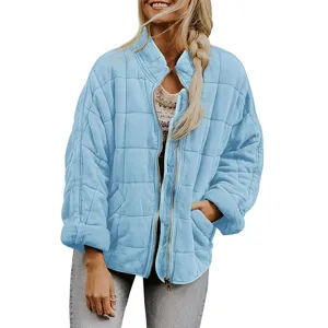 Veste matelassée bleu clair col montant zippé pour femme, vêtement d'hiver ample décontracté.