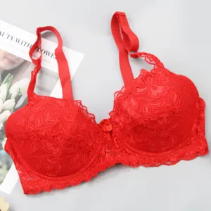 Sexy red lace push-up bra with adjustable straps and delicate floral design for women detail.