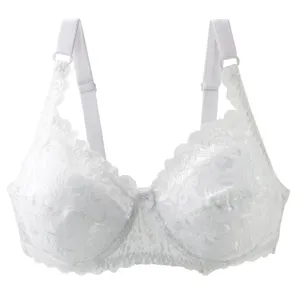 White lace push-up bra with floral embroidery, adjustable straps and supportive design.