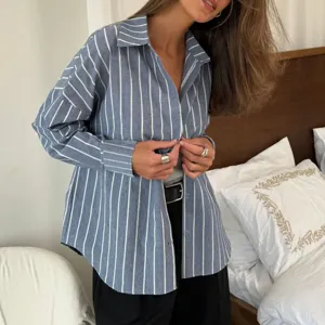 Casual blue and white striped long sleeve shirt for women, loose fit lapel button down blouse.