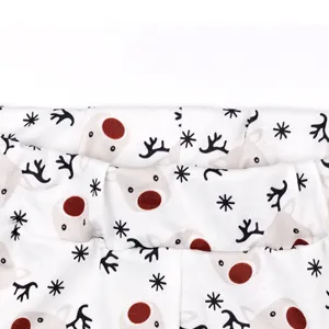 Christmas reindeer print fabric detail shot of women's casual two piece set garment.