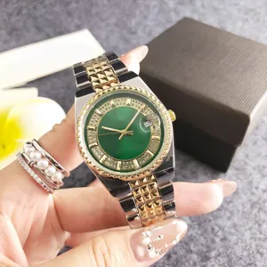 Luxury women's quartz watch with green dial, diamond bezel and two-tone bracelet.