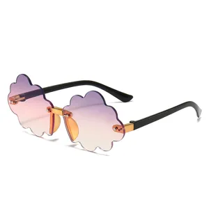 Kids fashion cloud sunglasses with gradient rimless lenses and cute design for outdoor use.