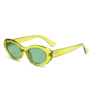 Lunettes de soleil ovales vintage pour femmes et hommes, monture verte translucide.