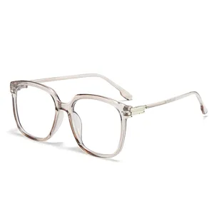 Occhiali da vista quadrati trasparenti con cerniere in metallo, montatura leggera e alla moda per tutti.