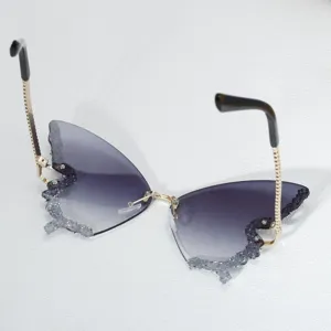 Exaggerated butterfly shaped rhinestone sunglasses rimless gradient ocean lenses fashion eyewear