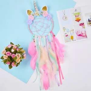 Handmade unicorn dream catcher with soft feathers and colorful ribbons, cute room wall hanging decor.