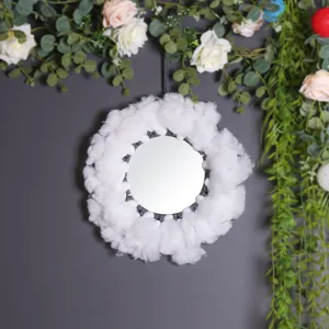 Specchio da parete rotondo boho con piume fatte a mano, elegante decorazione per la casa.