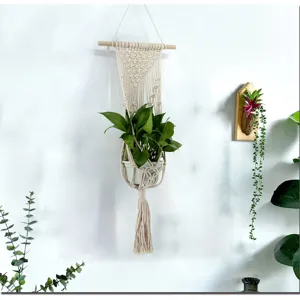 Support de plante en macramé coton fait main décoration murale bohème pour plantes vertes.