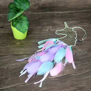 Colorful unicorn dream catcher wall decor with multi-color feathers and ribbons for bedroom