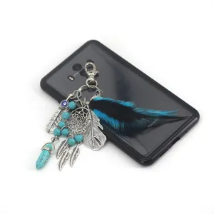 Atrapasueños llavero de piedra de cristal con pluma y colgante de bolso turquesa