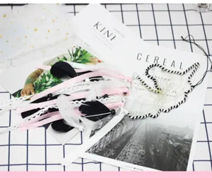 Feather dream catcher wall hanging decor with ribbons, perfect for bedroom and room aesthetic.