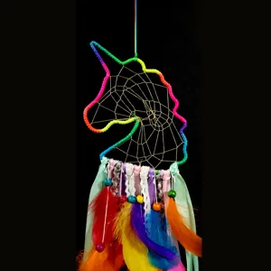 Colorful unicorn dream catcher wall hanging with feathers and ribbons for room decoration.