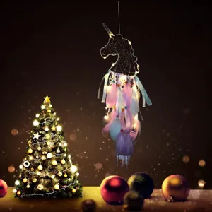 Detailed shot of unicorn dream catcher with glowing LED lights and soft feathers in room decor.