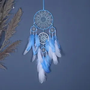 Exquisite blue and white handmade 5-ring dream catcher hanging ornament for room decor.