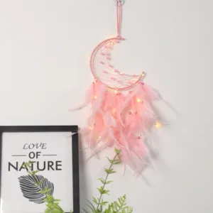 Pink moon dream catcher with LED lights and feathers, beautiful hanging wall decor for bedroom.