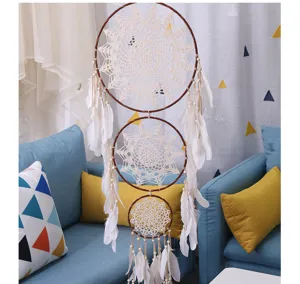 Bohemian large three ring crochet dream catcher with white feathers and wooden beads for wall decor