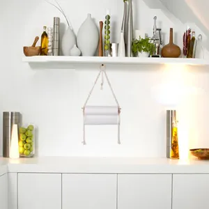Handmade macrame paper towel holder hanging toilet roll rack for kitchen bathroom decor style.