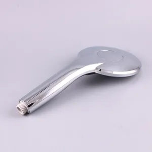 Chrome handheld shower head detail view, replacement nozzle accessory for bathroom fixtures.