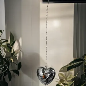 Heart shaped disco ball mirror pendant detail shot glass hanging ornament sparkling decor