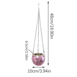 Detailed view of the pink disco ball hanging planter with metallic chains and mirror tiles.
