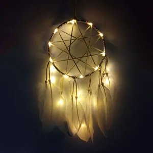 LED feather dream catcher hanging ornament with warm lights for home room wall decor detail.