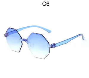 Gafas de sol sin montura degradadas con diseño ondulado y elegante estilo moderno.