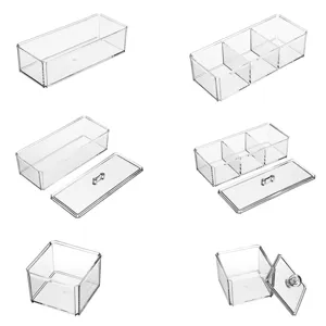 Détails de boîte de rangement en acrylique transparent avec compartiments multiples et couvercles.