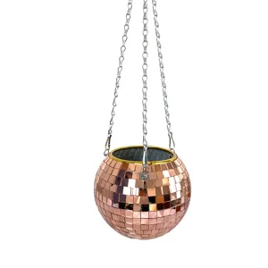 Rose gold mirror disco ball hanging planter with metal chains for indoor plants and home decor.