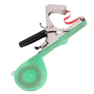 Garten Bindemaschine Detailansicht mit Metallmechanik, grünem Griff und roter Kunststoffbandrolle.