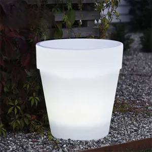 Detail de pot de fleur lumineux LED solaire d'exterieur, ideal pour decoration de jardin.