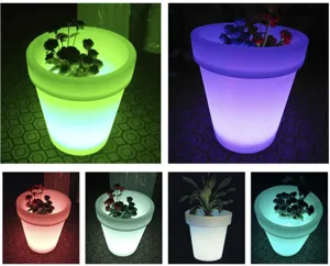 Joli pot de fleur lumineux LED solaire coloré pour décoration de jardin et terrasse.