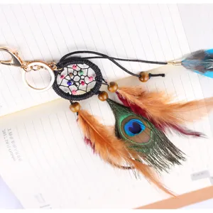 Llavero atrapasueños de plumas de pavo real natural colgante para bolso coche
