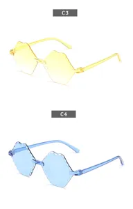 Kids rimless polygon sunglasses with gradient candy color lenses, stylish children eyewear.
