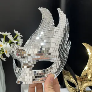 Detailed close-up view of a silver disco mirror mosaic mask, perfect for party props.