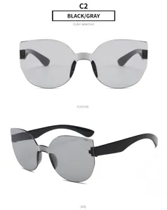 Einteilige rahmenlose Sonnenbrille mit Farbverlauf-Gläsern im modernen Cateye-Design für den Alltag.