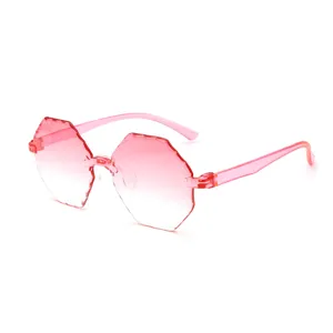 Gafas de sol sin montura degradado rosa para mujer, gafas de sol poligonales onduladas.